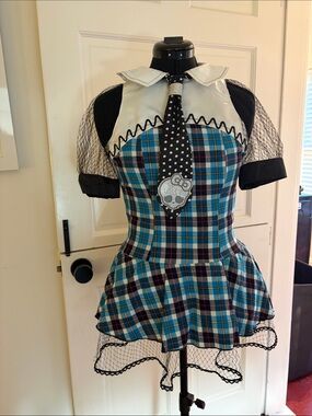 Plaid Peplum Dress with Black Mesh Sleeves and Tie